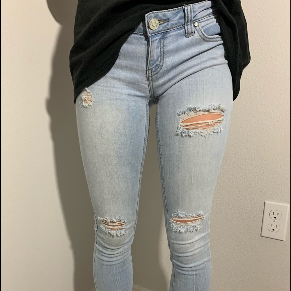 pale blue ripped skinny jeans